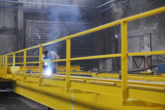 welder working indoors photo