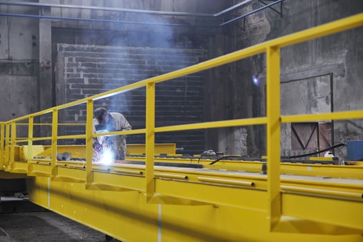 welder working indoors photo