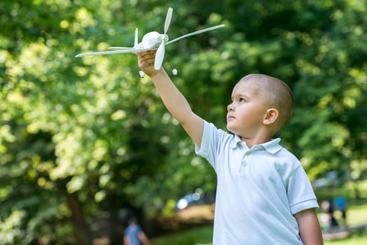 boy with airpane toy photo