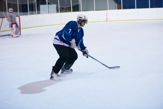 ice hockey player in action photo