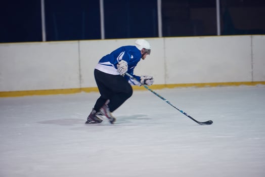 ice hockey player in action photo
