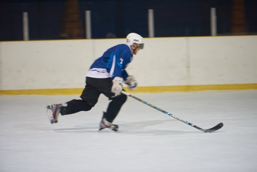 ice hockey player in action photo