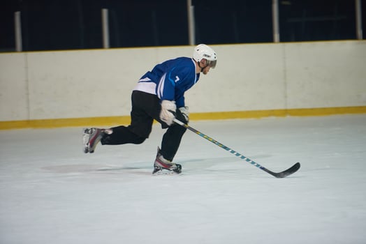 ice hockey player in action photo