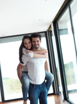 happy young romantic couple have fun and  relax at home indoors photo