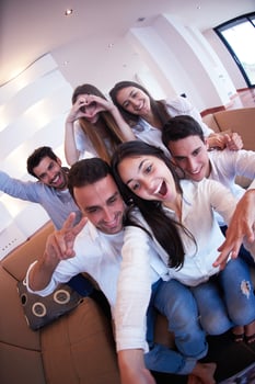 group of friends taking selfie photo