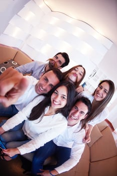 group of friends taking selfie photo