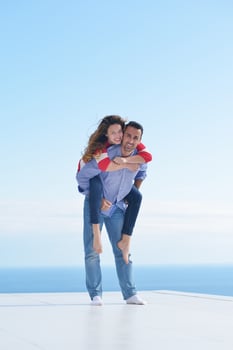 happy young romantic couple have fun relax photo