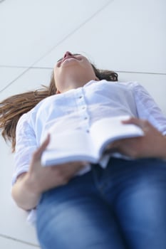 relaxed young woman at home photo
