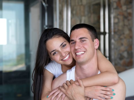 couple relax and have fun in bed photo