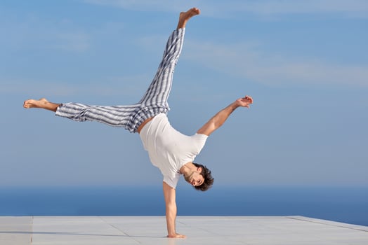 young man practicing yoga photo