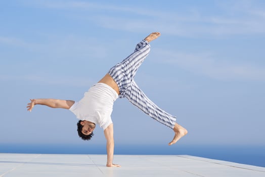 young man practicing yoga photo