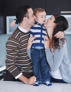 happy young family have fun  at home photo