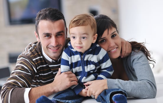 happy young family have fun  at home photo