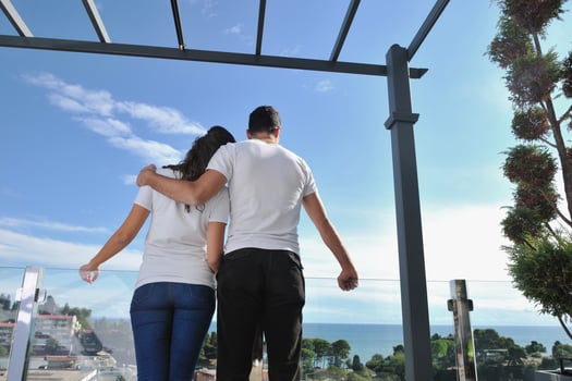 couple relaxing on balcony photo