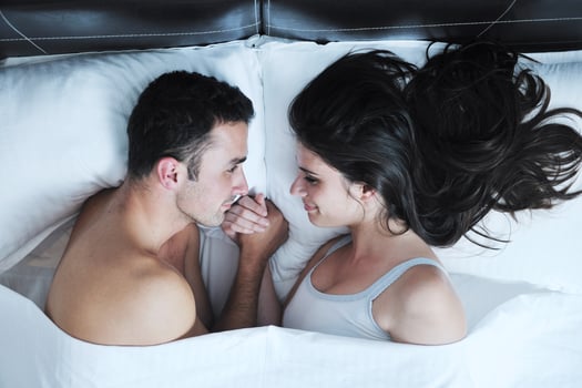 young couple have good time in their bedroom photo