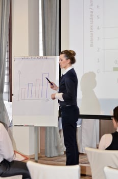business woman giving presentation photo