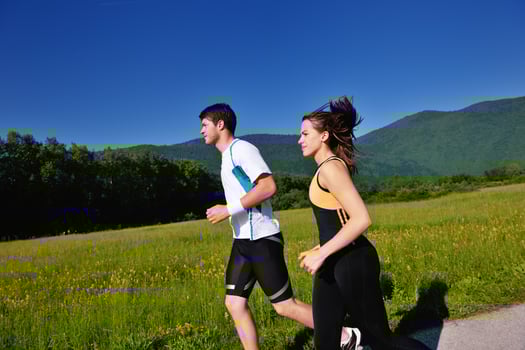 Young couple jogging photo