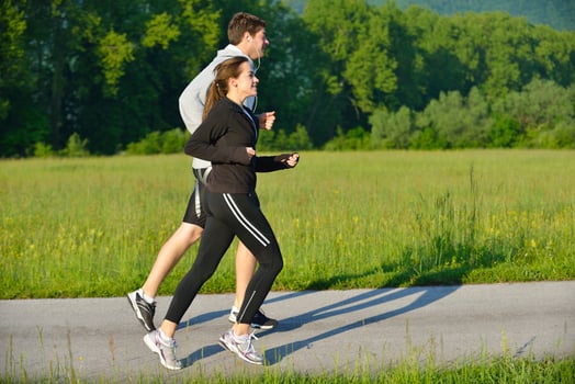 Young couple jogging photo