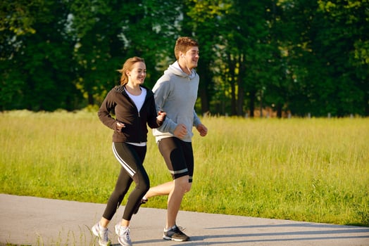 Young couple jogging photo