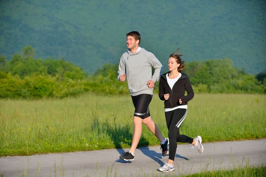 Young couple jogging photo