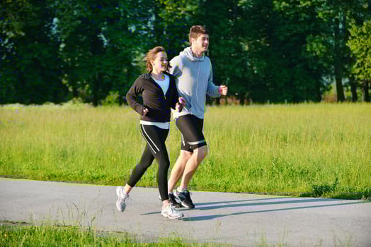 Young couple jogging photo