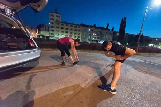 couple warming up and stretching photo