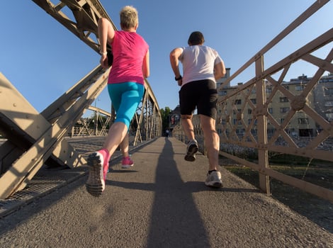 Couple jogging outside photo