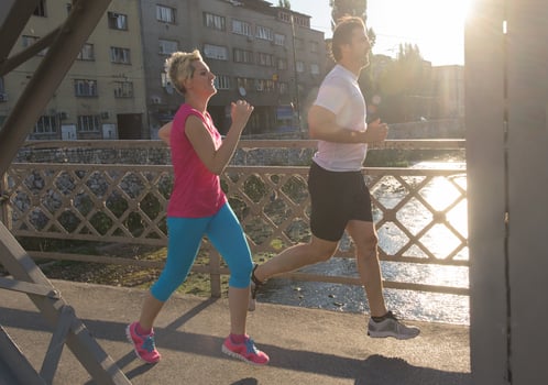 Couple jogging outside photo
