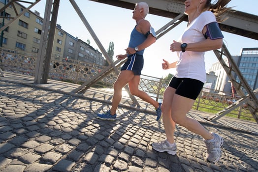 Couple jogging outside photo