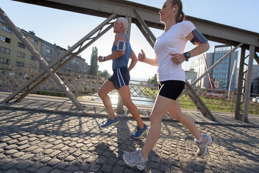 Couple jogging outside photo