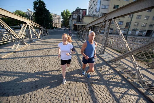 Couple jogging outside photo