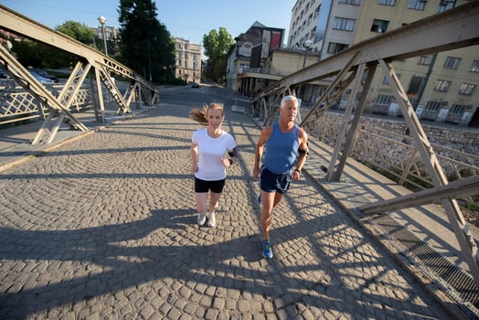 Couple jogging outside photo