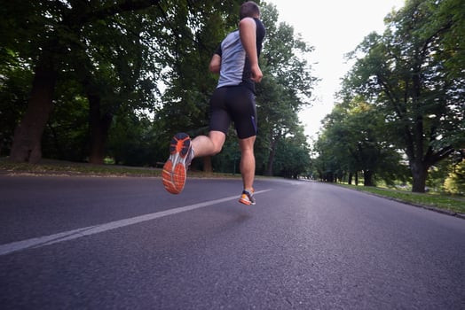 man jogging outside photo
