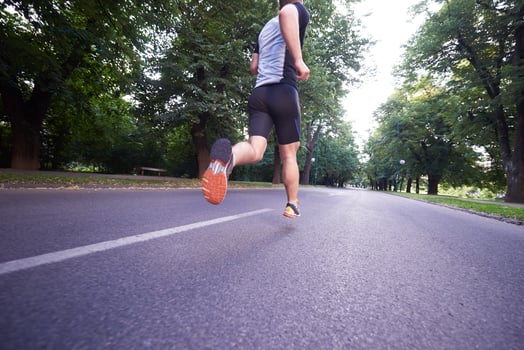 man jogging outside photo