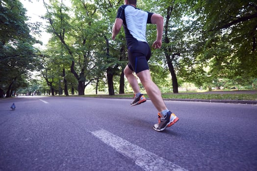 man jogging outside photo