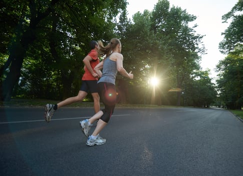couple jogging outside photo