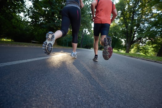 couple jogging outside photo
