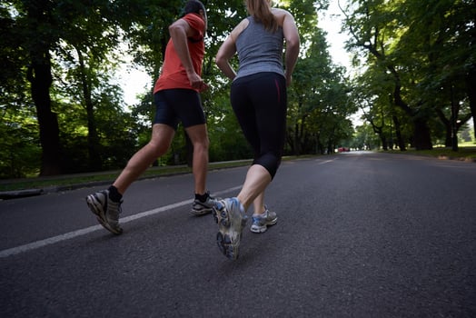 couple jogging outside photo