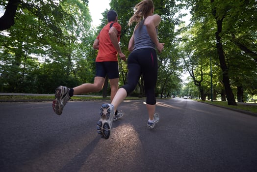 couple jogging outside photo