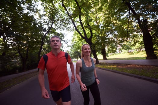 couple jogging outside photo