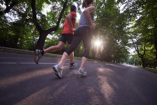 couple jogging outside photo