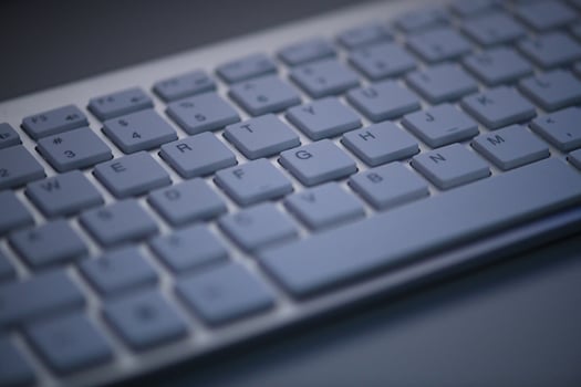 slim keyboard in dark night photo