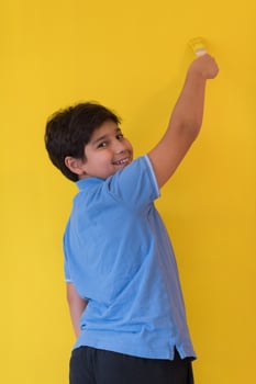 Portrait of a happy young boy painter photo