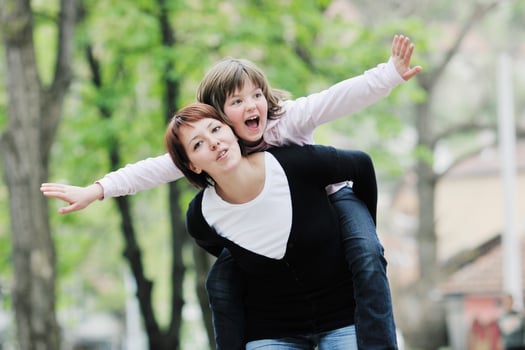 happy girl and mom outdoor photo