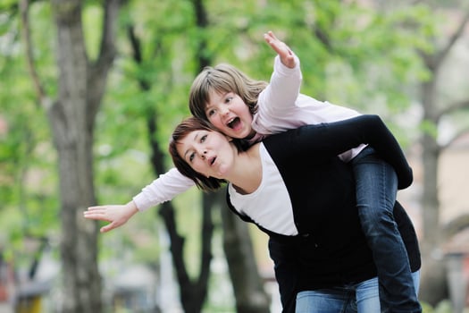 happy girl and mom outdoor photo