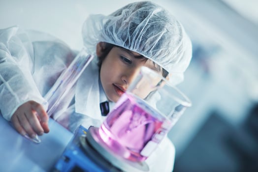 little child scientist in lab photo