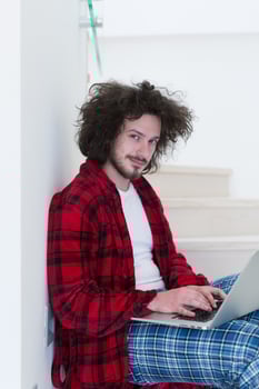 freelancer in bathrobe working from home photo