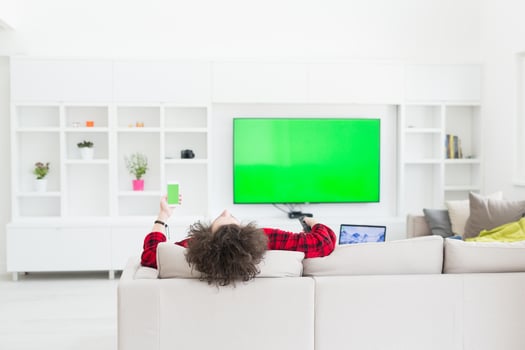 young man in bathrobe enjoying free time photo
