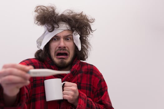 Man with flu and fever photo