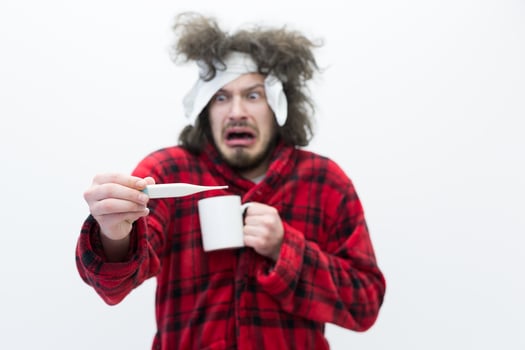 Man with flu and fever photo